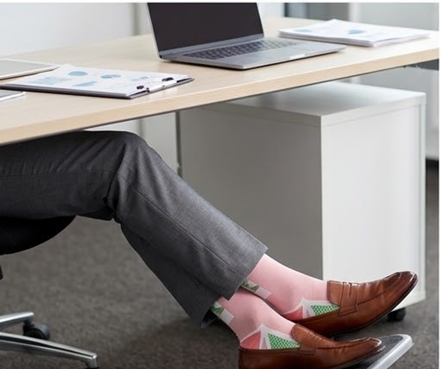 Compression socks worn at a desk through a long day